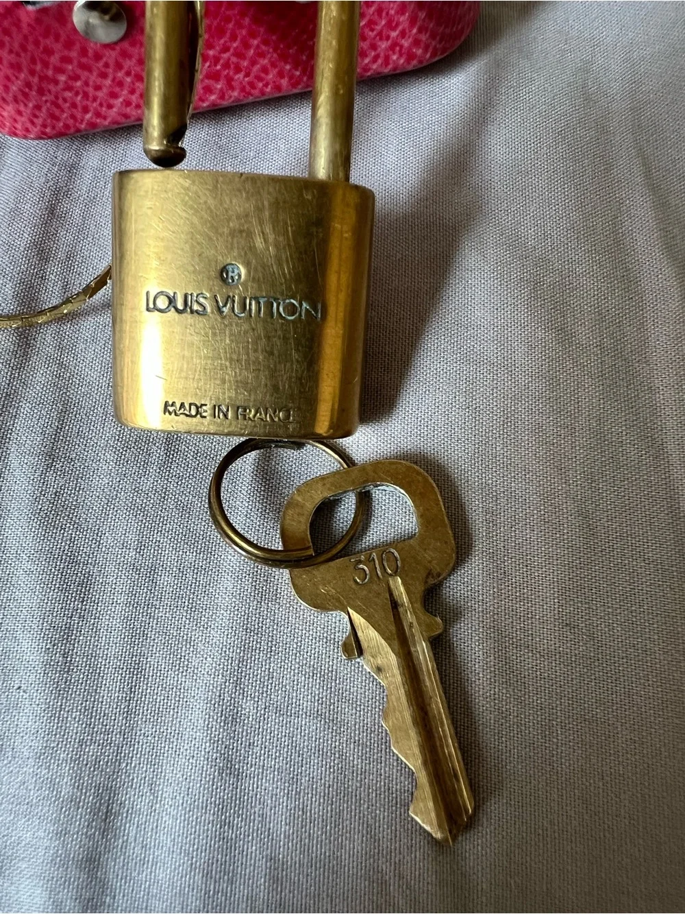 Louis Vuitton gold tone